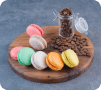 grain of coffee and different types of macarons